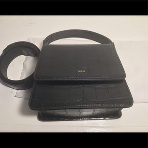 The Fae by JW PEI. Top handle, mini handbag. Vegan leather.